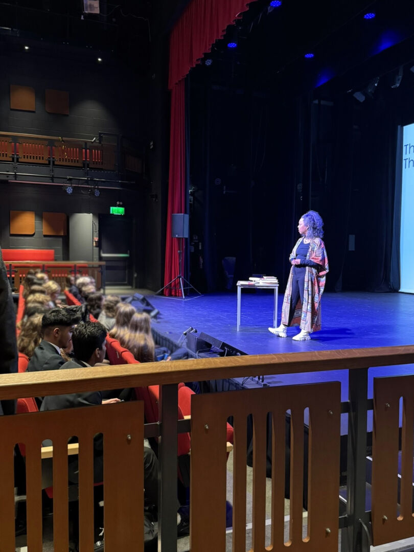 Photo Carolyn Bain at Roedean School giving a talk during Black History Month