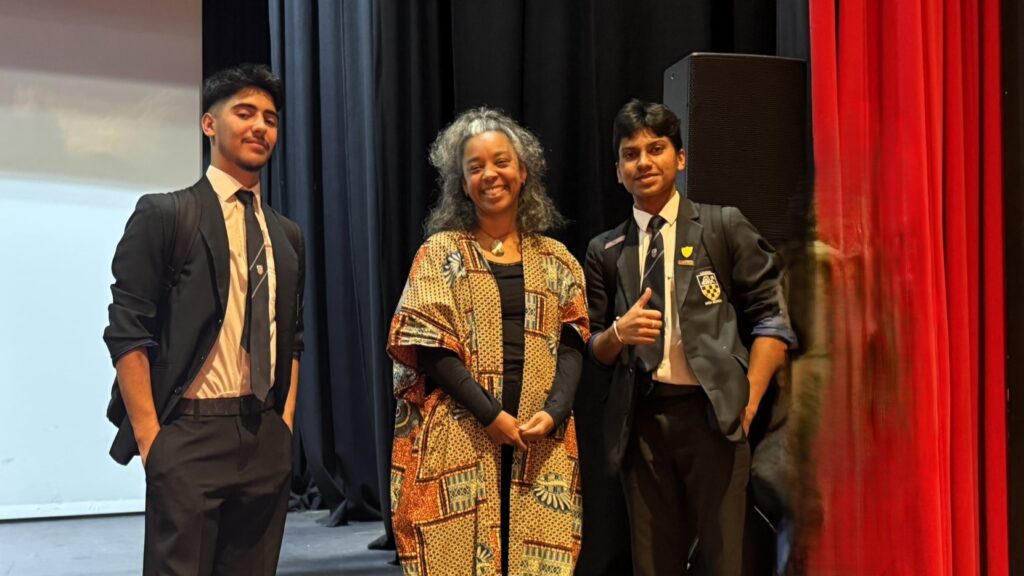 Longhill High School students, posing for a photo with Carolyn Bain