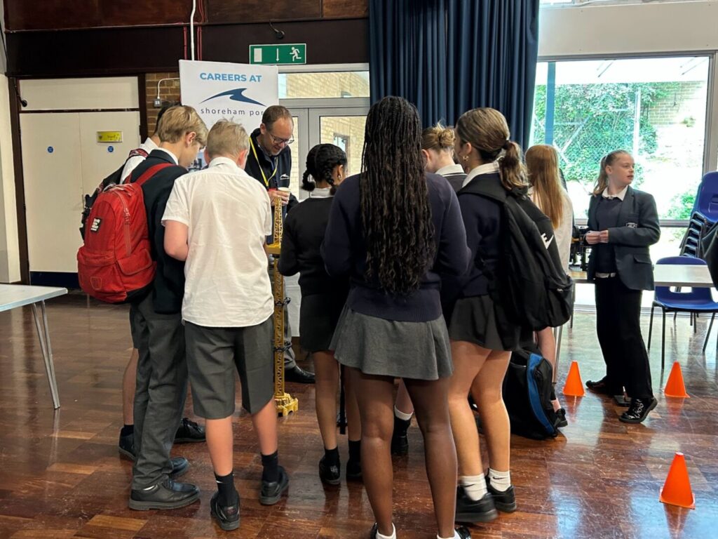 Students at Longhill's Career's Fair 2025, gathered around Careers and Shoreham Port Stand.