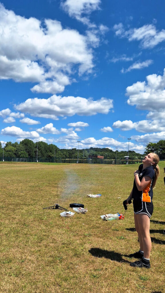 Longhill Student launching a rocket into the skies at the STEM Trip at BACA