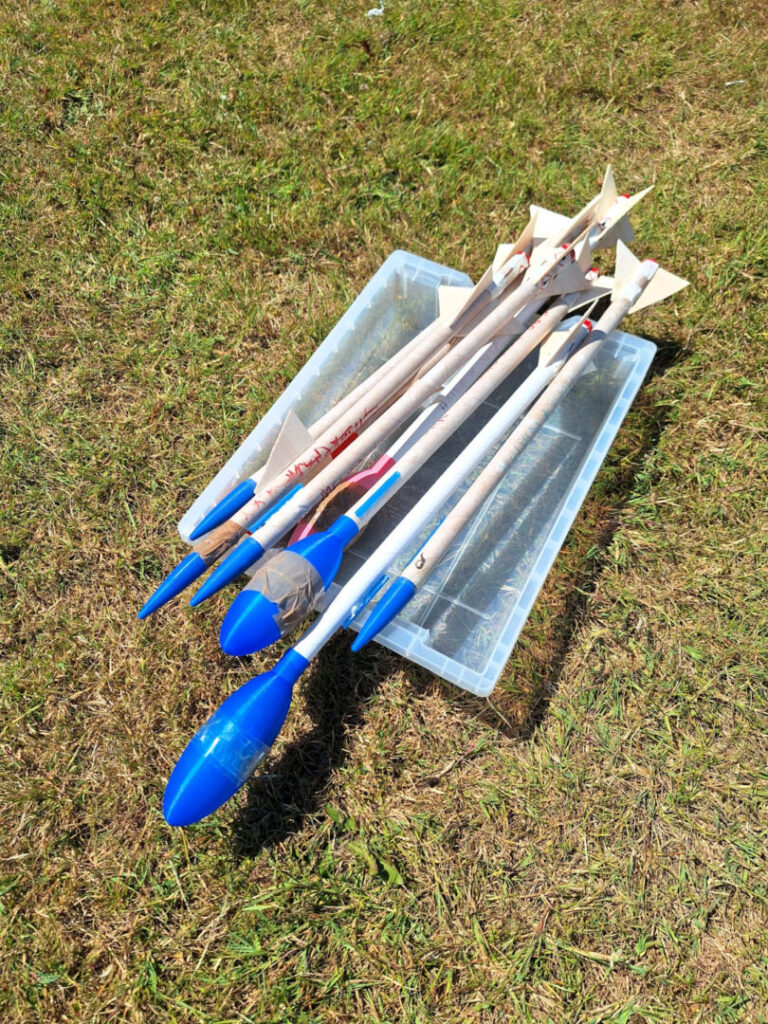 Image of rockets on top of a container.
