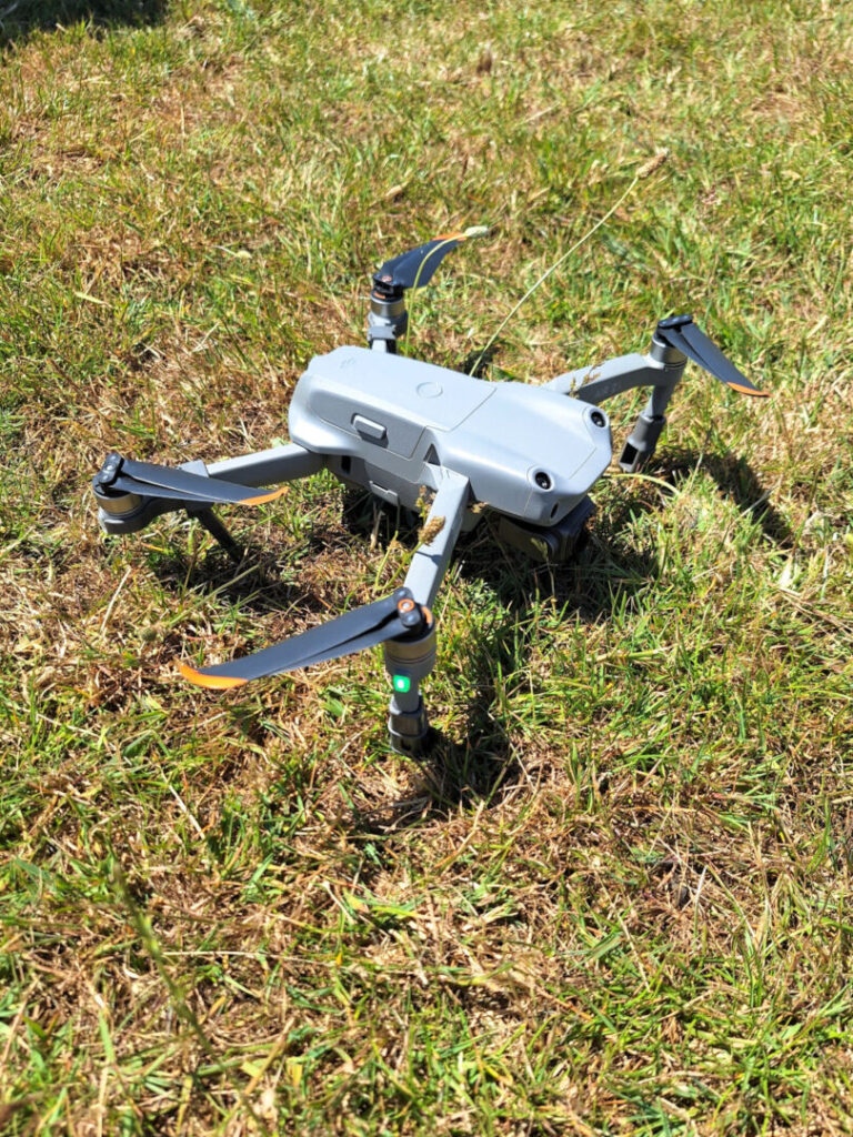 Photo of a drone parked on the floor at BACA playing fields