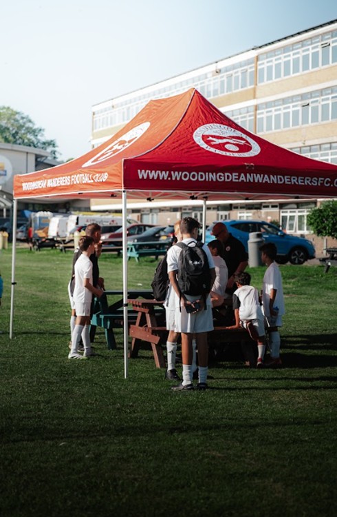 Students gathered under Woodingdean Wanderers Marquee