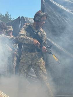 CCF cadet holding a rifle