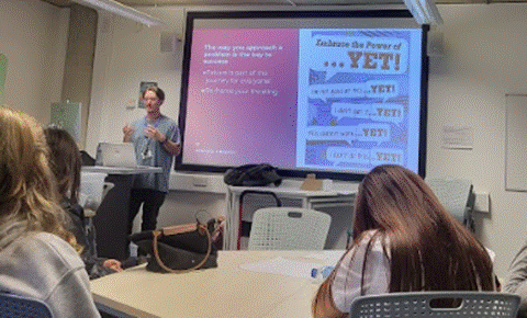 Students receiving a lecture on Growth Mindset.