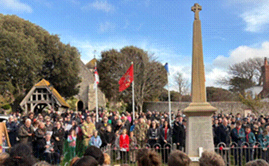 Remembrance parade at Rottingdean memorial garden.