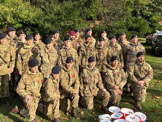 CCF Staff and Students posing for a photo in their uniform at the Rottingdean Memorial Garden
