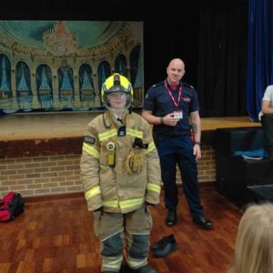 Student in fire service uniform at Careers Week 2026