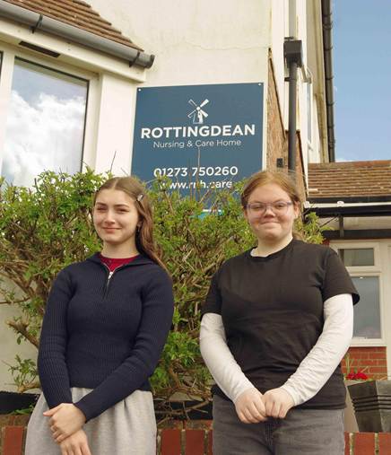 Students posing outside of Nursing and Care Home