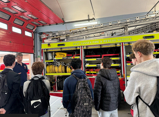 Students being shown Fire Engine and the equipment stored inside.