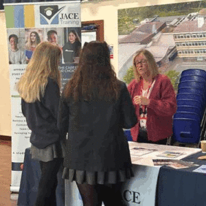 Image of students talking to one of the stall holders at the Careers Fair 2026