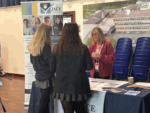Image of students talking to one of the stall holders at the Careers Fair 2026