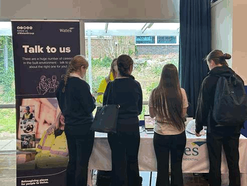 Image of students talking to one of the stall holders at the Careers Fair 2026