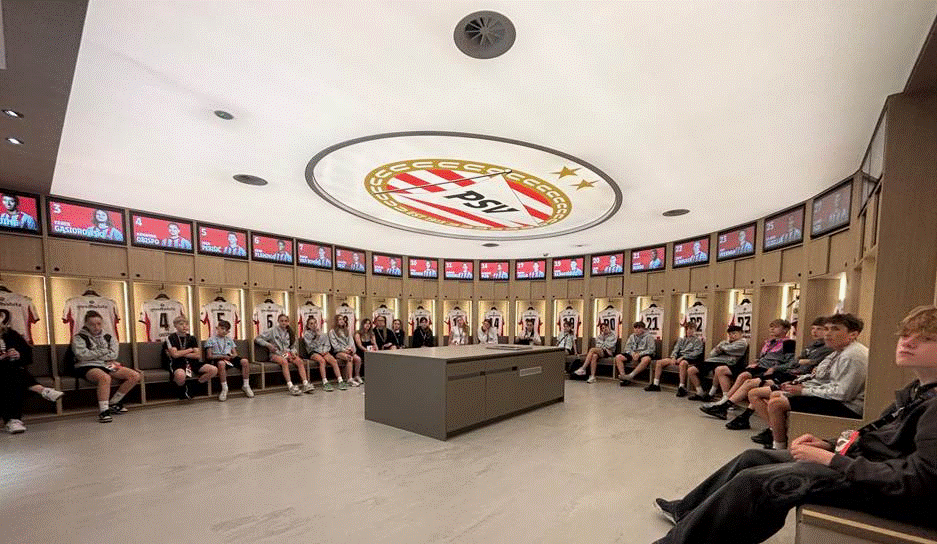 Students in the changing room of PSV Eindhoven Football Club