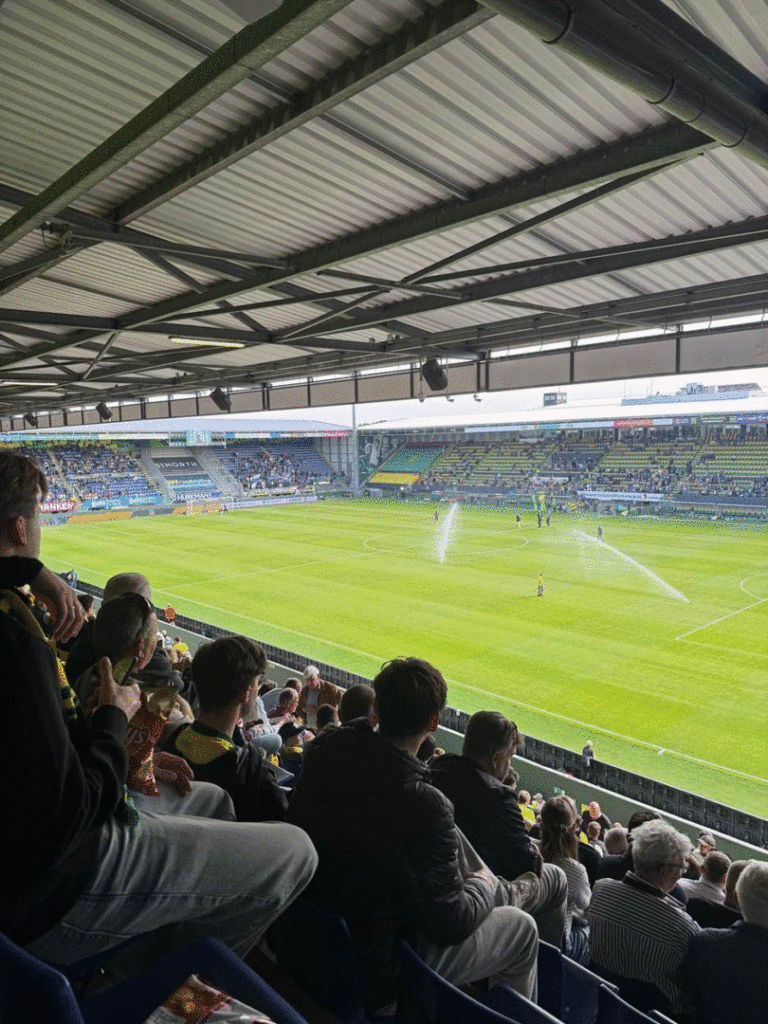 Students watching a live match.